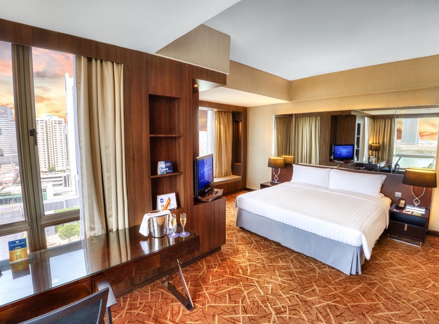 Premier Executive Suite Bedroom Peninsula Excelsior Hotel en Singapore 